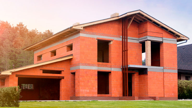 Large-format ceramic blocks are used to create houses